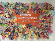 Students unique hand prints acknowledging differences between us but together a message of inclusion at RPS